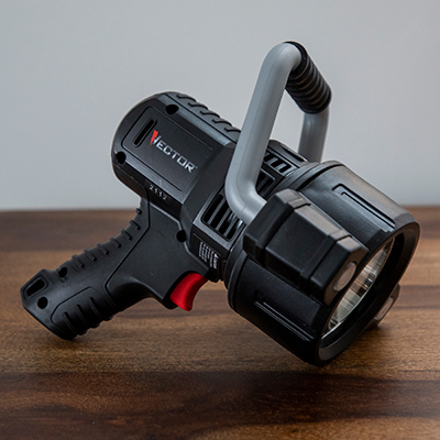 VECTOR<sup>&reg;</sup> Rechargeable Li-Ion LED Spotlight - 
 Built to last and ready to go anywhere this powerful ultra bright LED spotlight reaches 750 Lumens with a continuous 7 hour run time. Features a Li-Ion rechargeable battery with charging micro USB port and charging status LED indicator. Other features include a tough durable housing, heavy duty bezel and pistol grip ergonomic handle. Includes AC cube, micro USB cable and is UL/ ETL certified. 